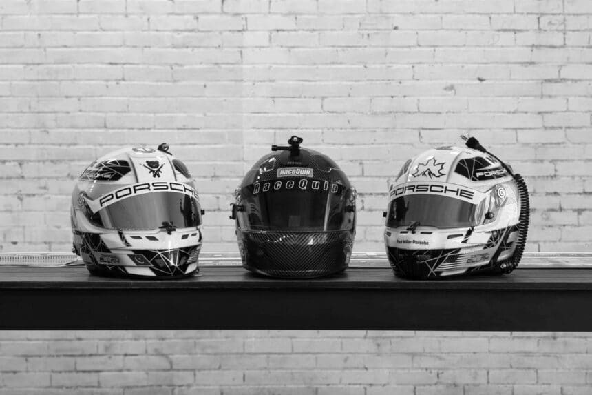 Racing helmets on display inside Throttle Racing Club, a motorsports themed coffee shop in Denville, NJ