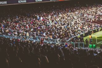 Soccer fans pack a stadium during a match ahead of the 2026 World Cup Final at MetLife Stadium