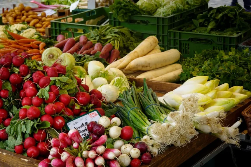 Fresh vegetables on a farmers market stand, illustrating the Denville Farmers Market in Denville, NJ