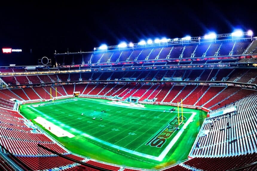 Football stadium under lights at night, illustrating the Morris Knolls football 2026 schedule