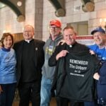 Bishop Kevin J. Sweeney with members of St. Cecilia's LIFE Runners