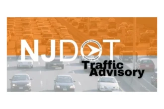 NJDOT Traffic Advisory graphic over a photo of highway traffic