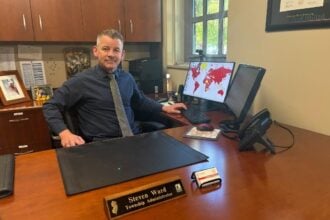 Denville Township Administrator Steve Ward at his desk